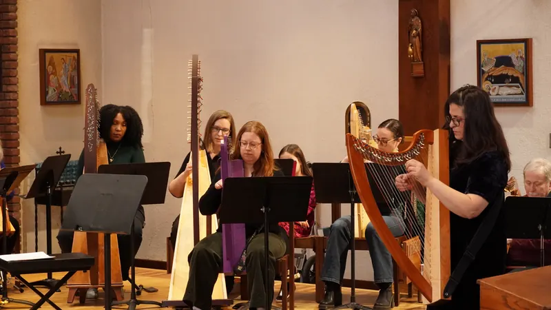 Harp students performing in concert